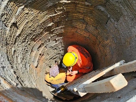 Mulher resgatada da poço.png